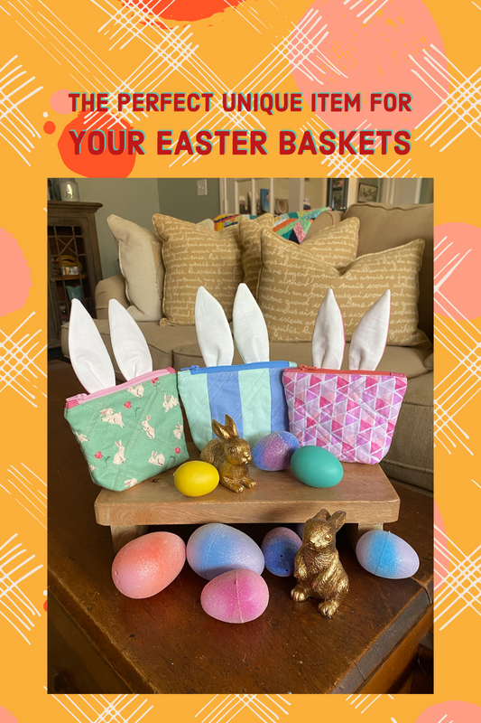 Three quilted zippered bunny pouches with stand up white bunny ears, displayed with gold bunny figurines and colorful Easter eggs. 